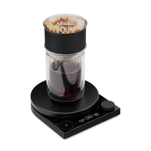 Fellow Tally™ Pro Precision Scale | Studio Edition with glass pour-over and Brew Assist Mode on.