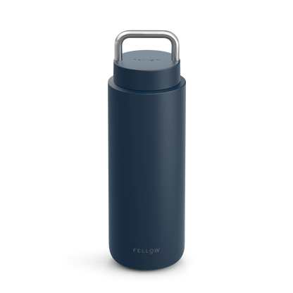 Navy Carter Carry Travel Mug by Fellow with metal handle and logo near base.