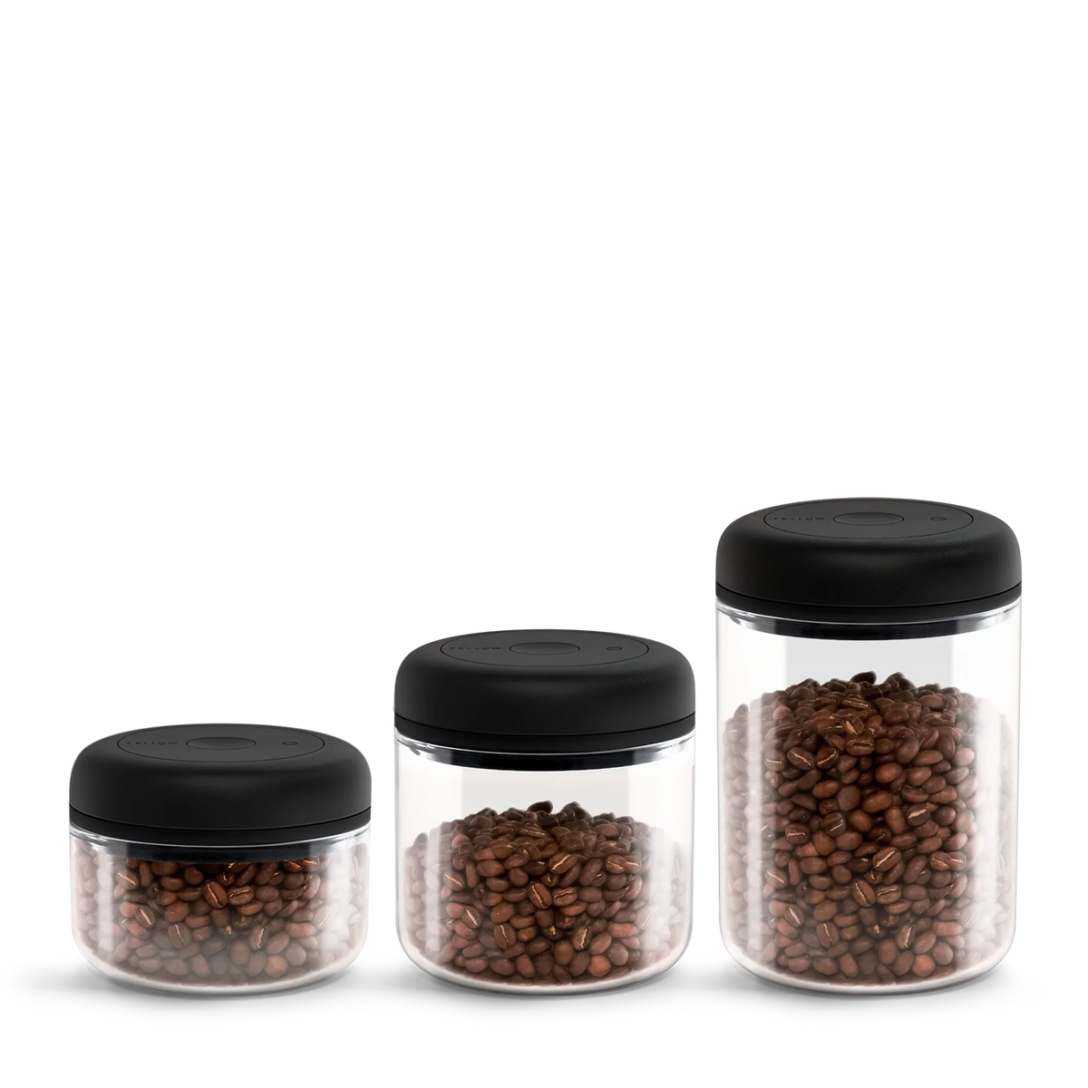 Fellow Atmos Vacuum Canister 3 Pack: clear jars with black lids in multiple sizes.
