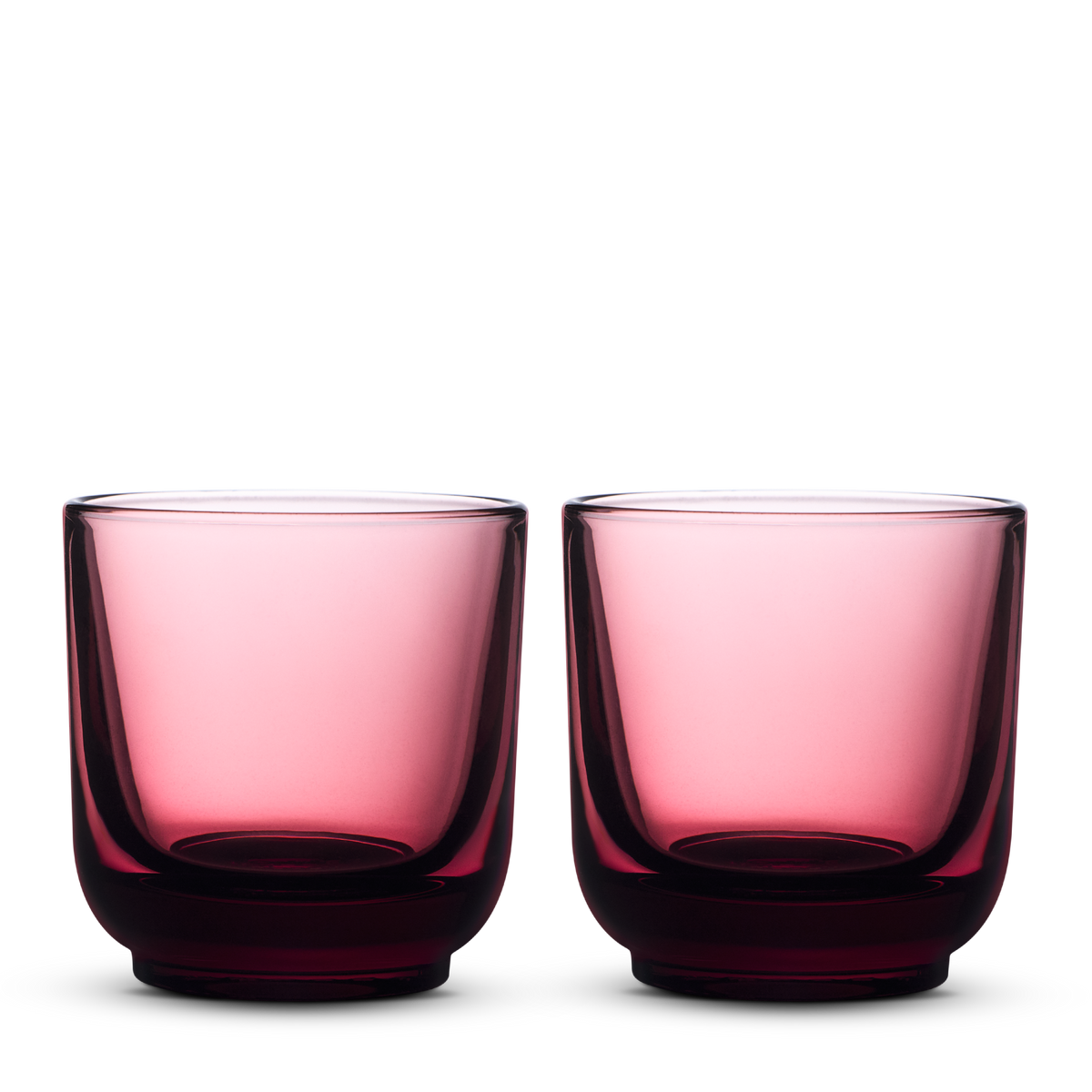 Fellow Pirch Espresso Glasses in Garnet—set of two round tumblers on a white background.