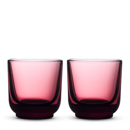 Fellow Pirch Espresso Glasses in Garnet—set of two round tumblers on a white background.