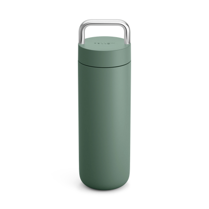 Fellow Carter Carry Travel Mug in Smoke Green with silver handle on a white background.