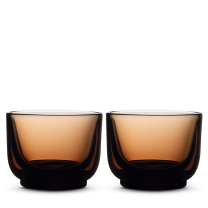 Fellow Pirch Espresso Glasses in amber feature artisanal glassware and flavor-enhancing design.