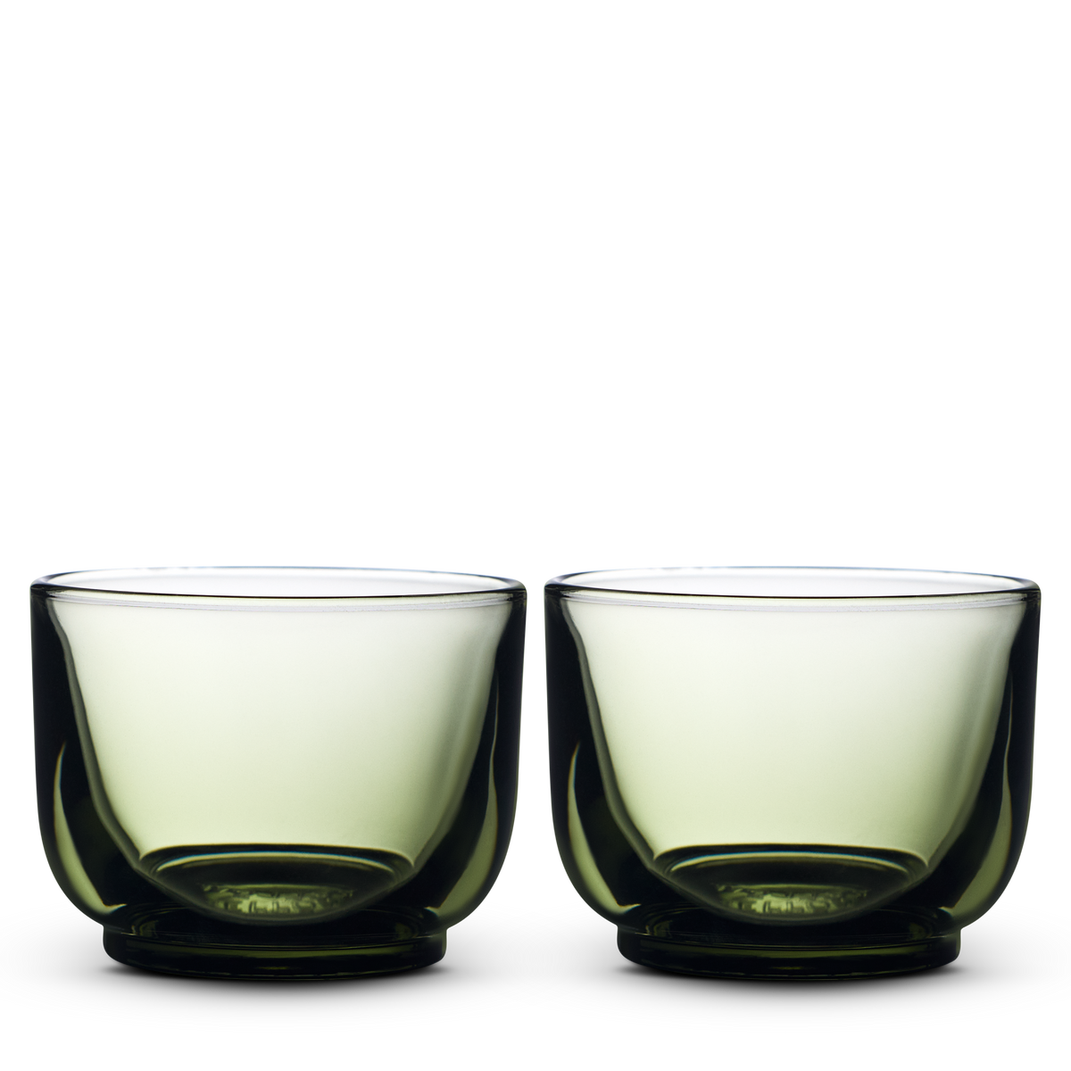 Two Fellow Pirch Espresso Glasses in Woodland, side by side on a white background.