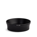 Fellow Espresso 58 mm Magnetic Dosing Funnel, black and round with logo on the side.