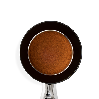 Top view of Fellow Espresso 58 mm Magnetic Dosing Funnel on white background.