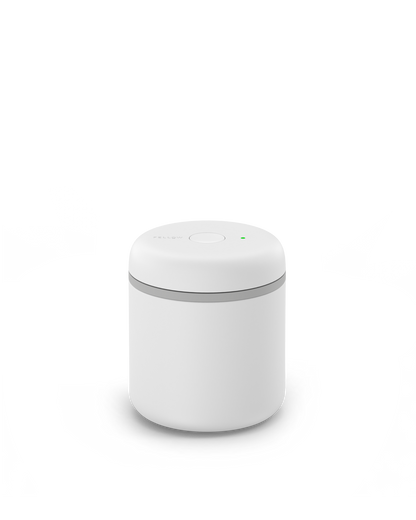 Fellow Atmos Vacuum Canister: small, round, white with button and green light for sealed storage.