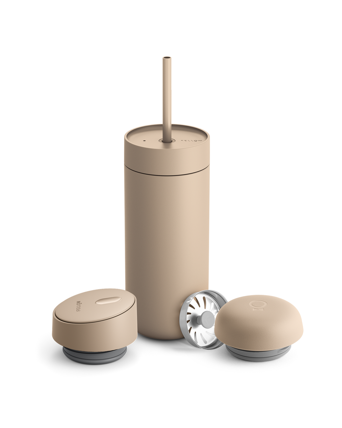 Fellow Carter 3-in-1 Lid System: beige mug with straw, two lids, and metal filter.