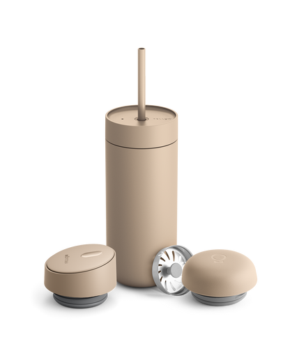 Fellow Carter 3-in-1 Lid System: beige mug with straw, two lids, and metal filter.