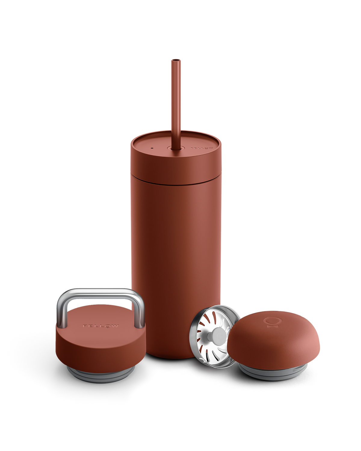 Fellow Carter 3-in-1 Lid System mug in rust with straw, metal handle lid, and round lid.