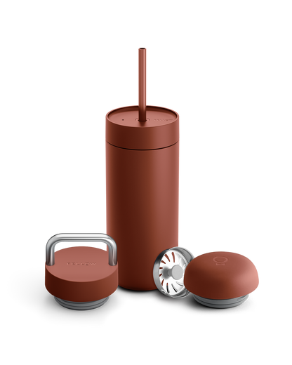 Fellow Carter 3-in-1 Lid System mug in rust with straw, metal handle lid, and round lid.