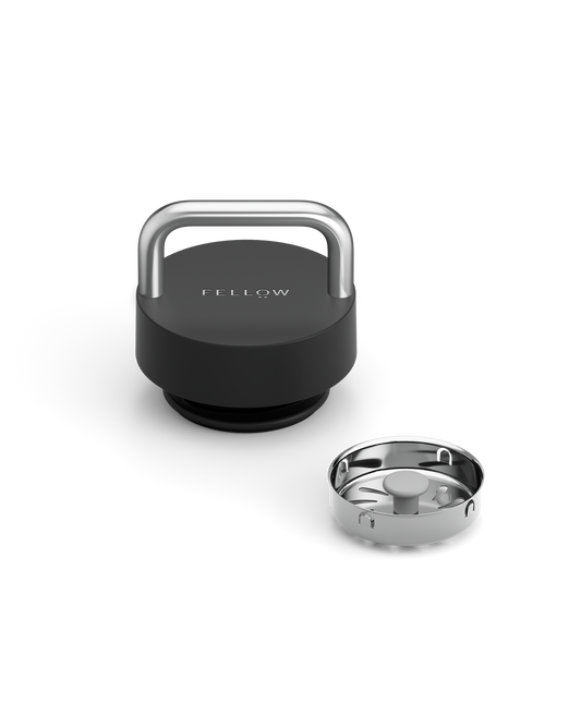 Fellow The Carry Lid in black and silver with detachable metal filter, on white background.