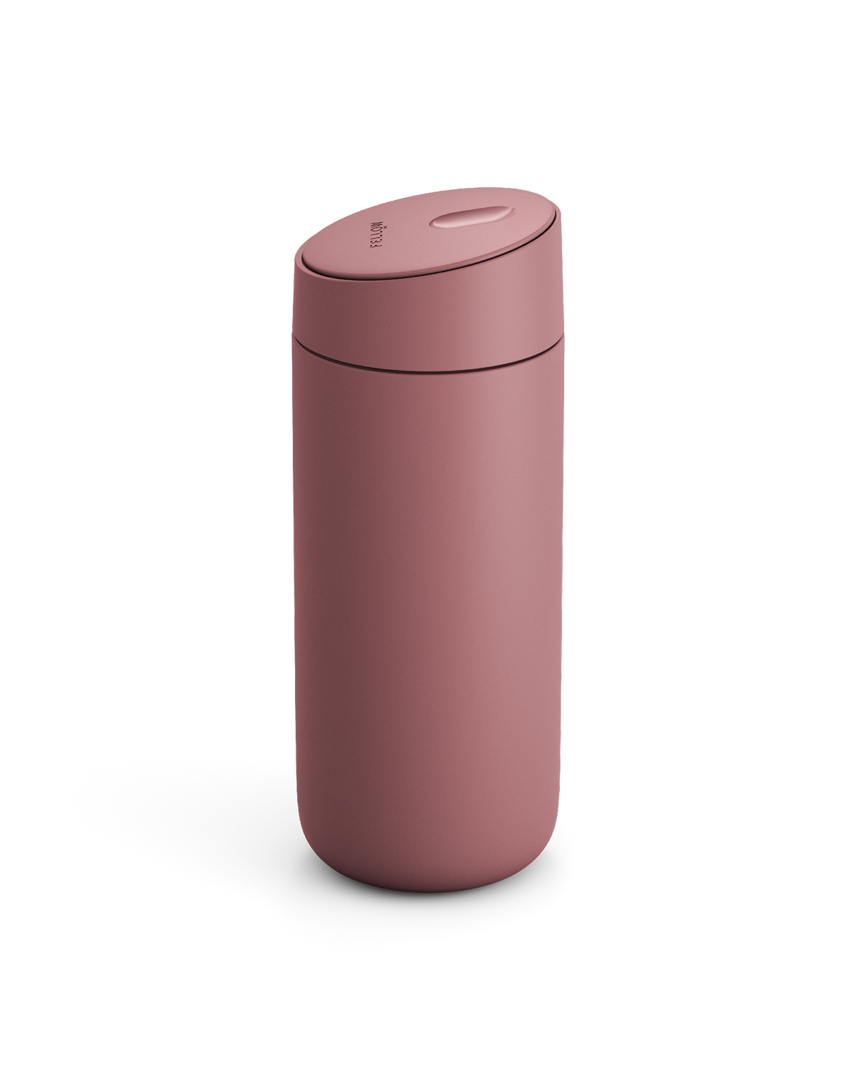 The Fellow Carter Slide Mug is a matte pink reusable travel mug with a rounded lid.