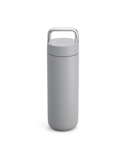 Fellow Carter Carry Travel Mug in Matte Grey with silver handle on a plain white background.