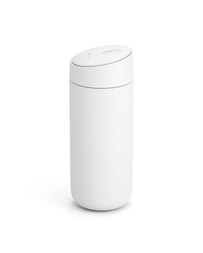 Fellow Carter Slide Mug, white and cylindrical with angled lid, on plain white background.