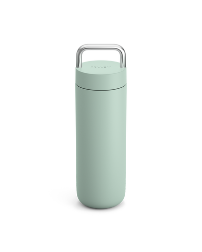 Fellow Carter Carry Travel Mug in Mint Chip with silver handle, on a white background.
