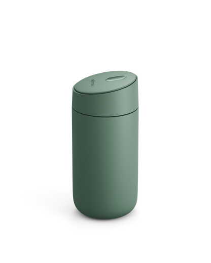 Fellow Carter Slide Mug in matte green with oval lid shown on white background.