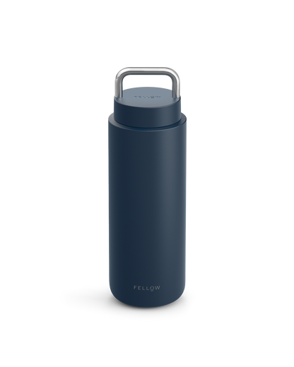 Stone Blue Fellow Carter Carry Travel Mug with handle and brand name on the front.
