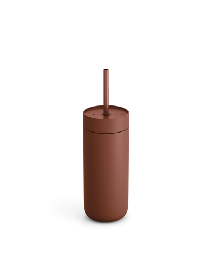Fellow Carter Cold Tumbler with lid and straw on a white background.