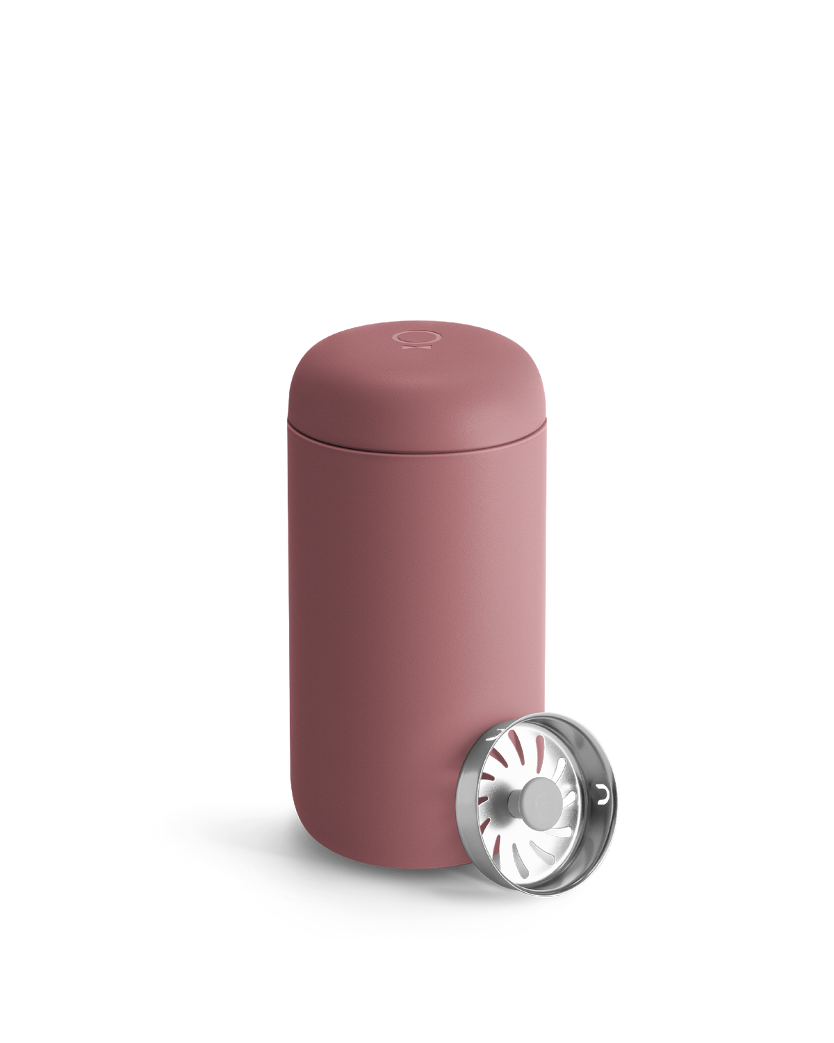 A pink Fellow Carter Move Mug with metal infuser lid sits beside it.