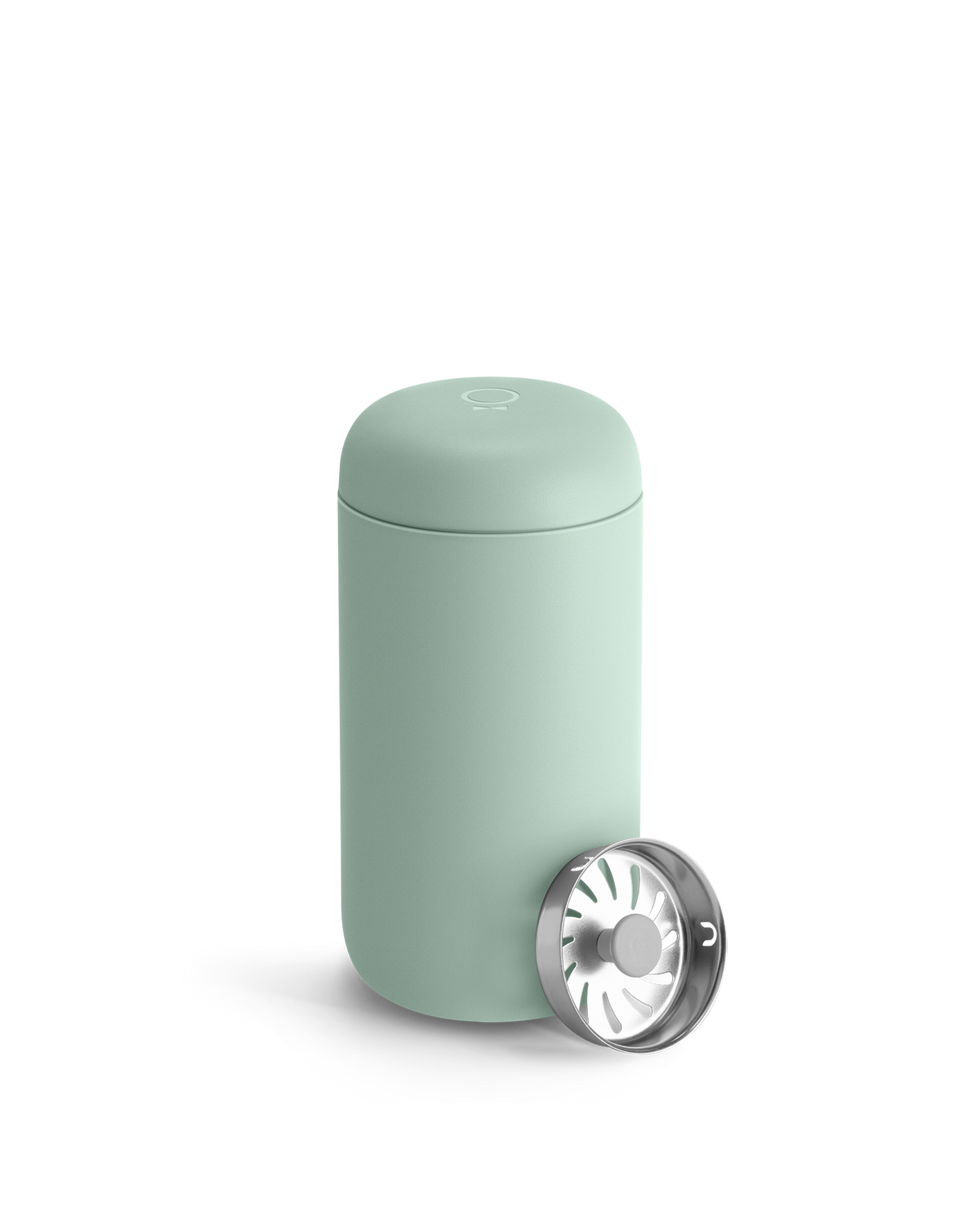 Light green Fellow Carter Move Mug with removable silver lid placed beside it.