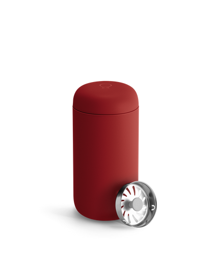 Red Fellow Carter Move Mug with separate round metallic lid in front.