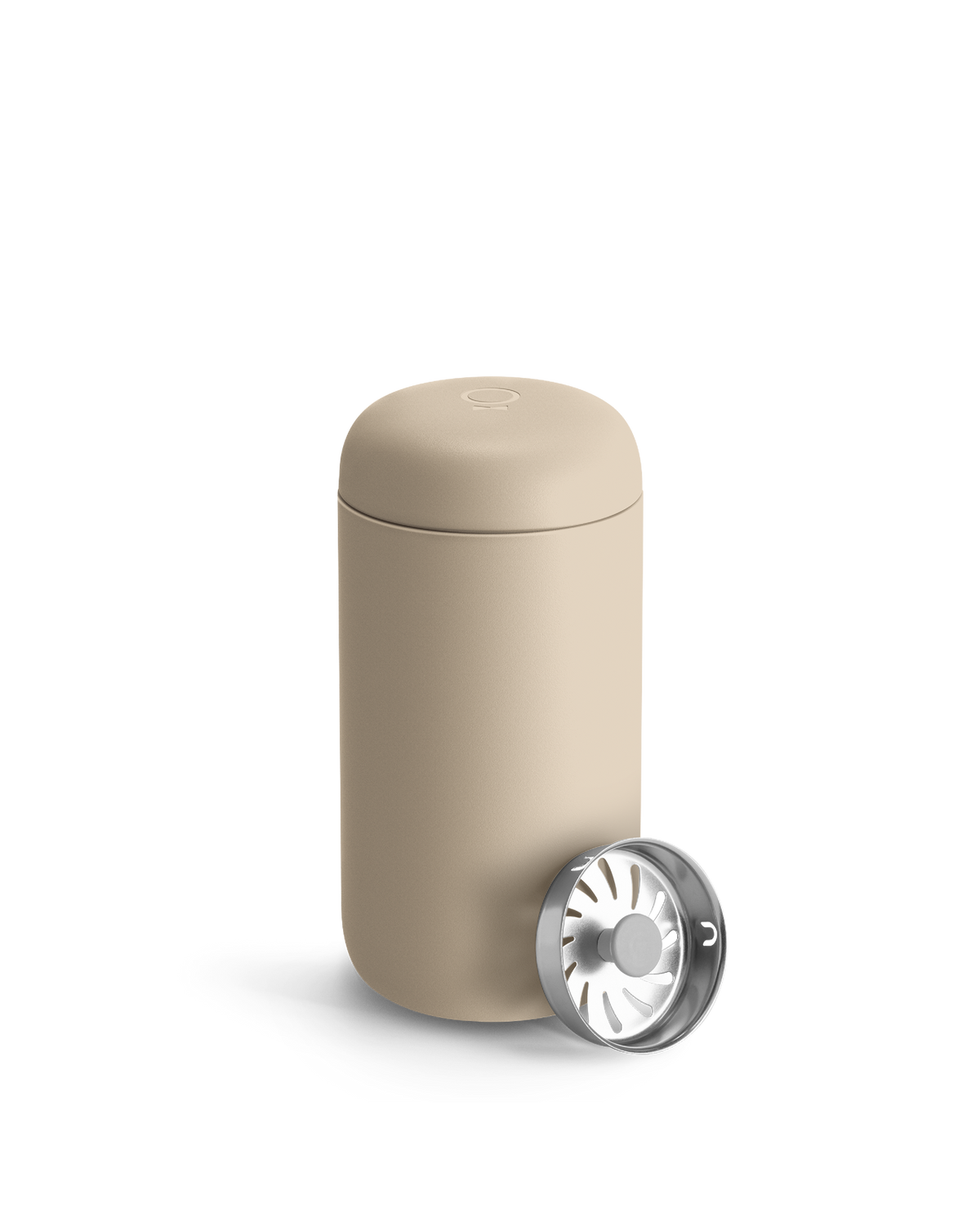 Beige Fellow Carter Move Mug with removable metal infuser lid placed beside it.