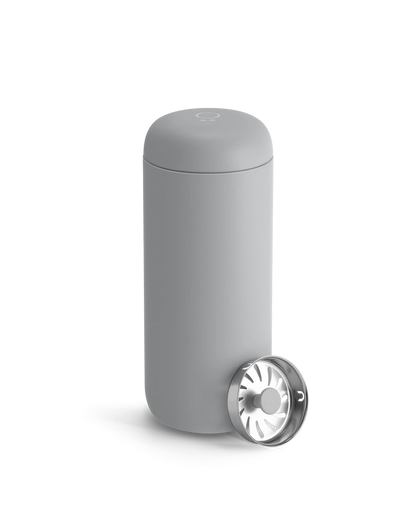 A matte gray Fellow Carter Move Mug with removable strainer on a white background.