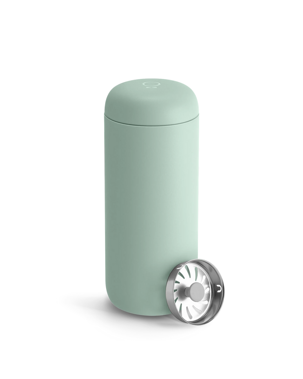 Fellow Carter Move Mug in light green with stainless steel strainer on a white background.