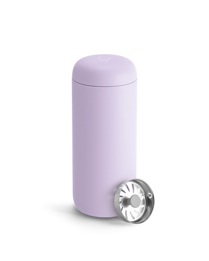 Light purple Fellow Carter Move Mug with removable metal strainer on a white background.