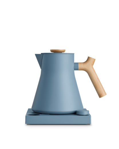 Fellow Corvo EKG Electric Kettle: fast, all-purpose blue kettle with wooden handle and base.