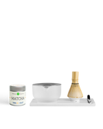 Fellow x Yama Matcha Set: tin, bamboo whisk, spoon, and ceramic bowl on a tray by Fellow.