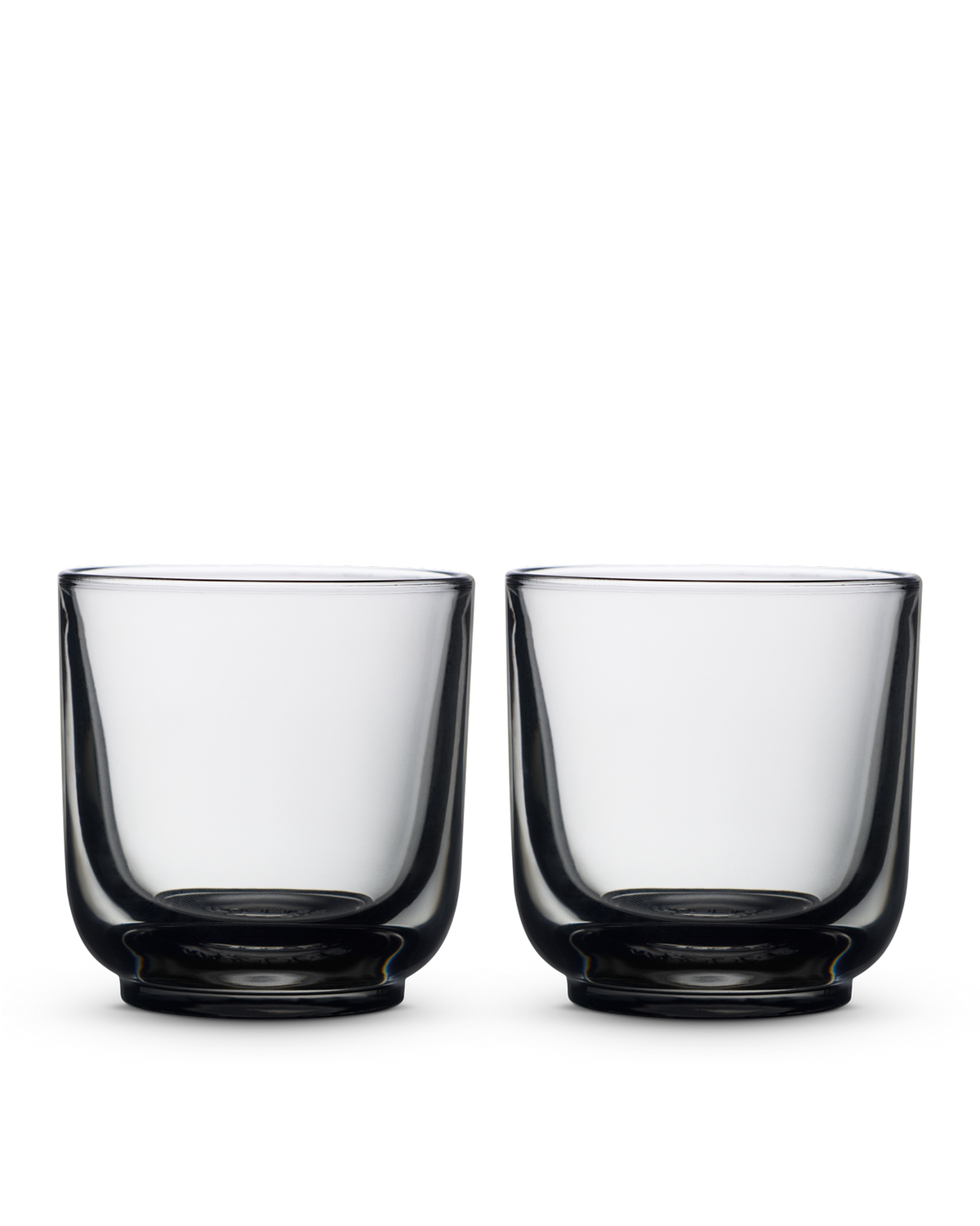Two Pirch Espresso Glasses by Fellow sit side by side on a plain white background.