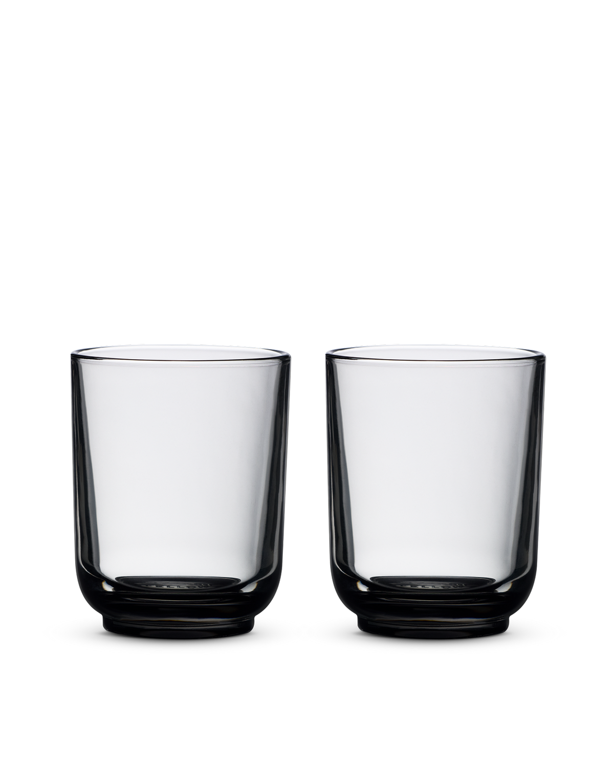 Two clear Pirch Espresso Glasses by Fellow on a plain white background.