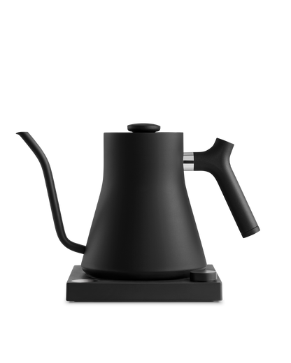 Fellow Rebrew Stagg EKG electric kettle in matte black with gooseneck spout on square base.