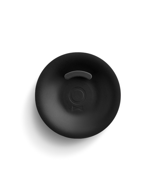 Fellow Series 1 Backflush Disc, black and circular with a small slit, viewed from above.