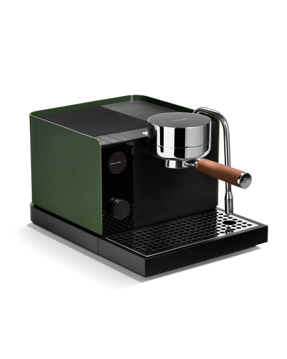Fellow Espresso Series 1 in Woodland + Walnut, with wood handle and metal spout on black tray.