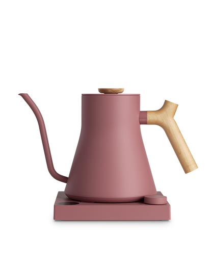 Fellow Stagg EKG Electric Kettle in pink, quick heat, wooden handle, and matching base.