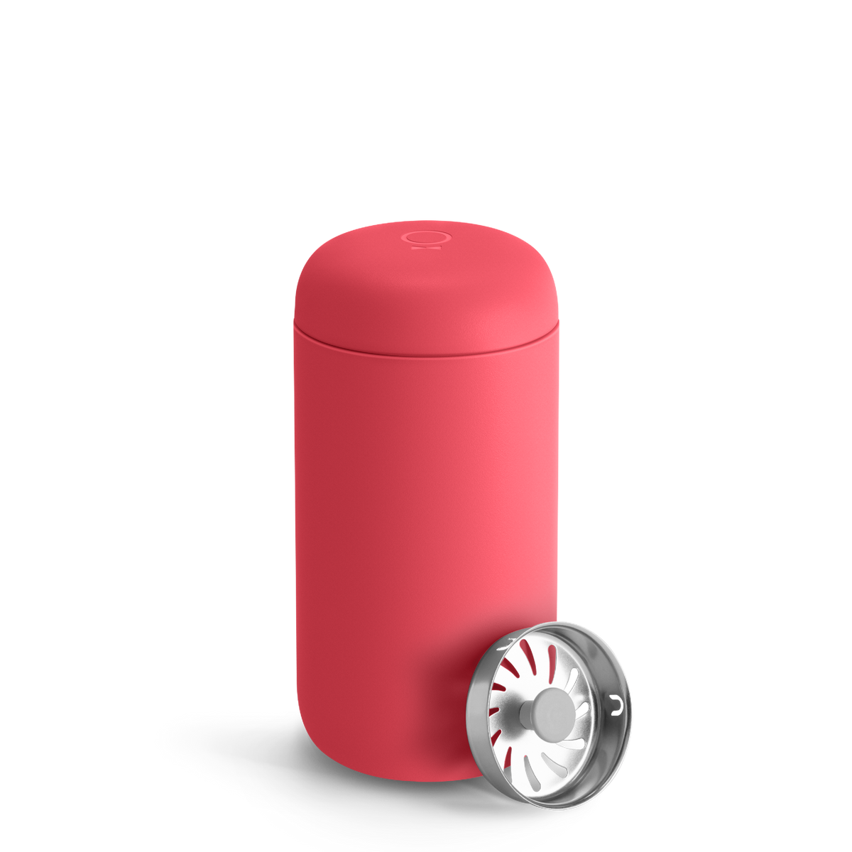 A coral Carter Move Mug by Fellow with a separate round metal lid on a white background.