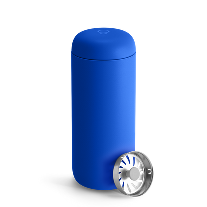 An Electric Cobalt Fellow Carter Move Mug with a silver infuser on a white background.