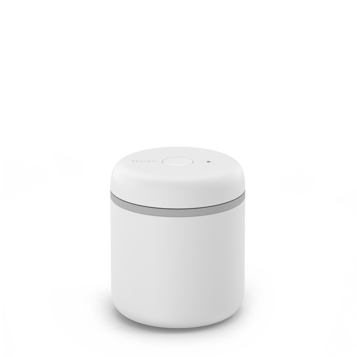 A small, round Fellow Atmos Vacuum Canister in matte white with a button and green indicator.